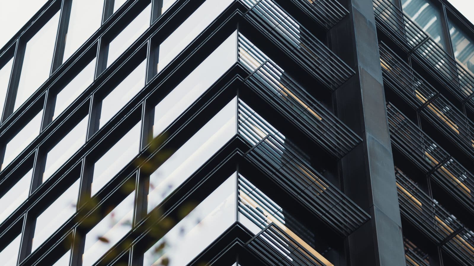 Geometric glass facade of a contemporary office building