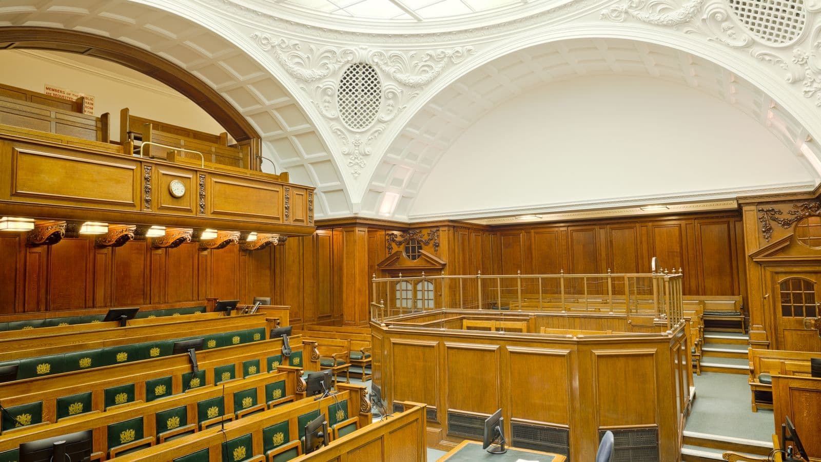 Historic courtroom with an empty judge and jury area